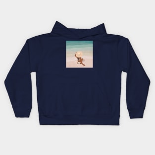 Girl in hat on the beach Kids Hoodie